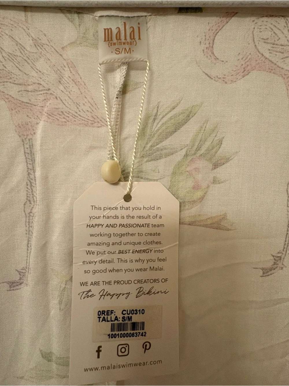 NWT cover/robe from Malai. Size S/M.